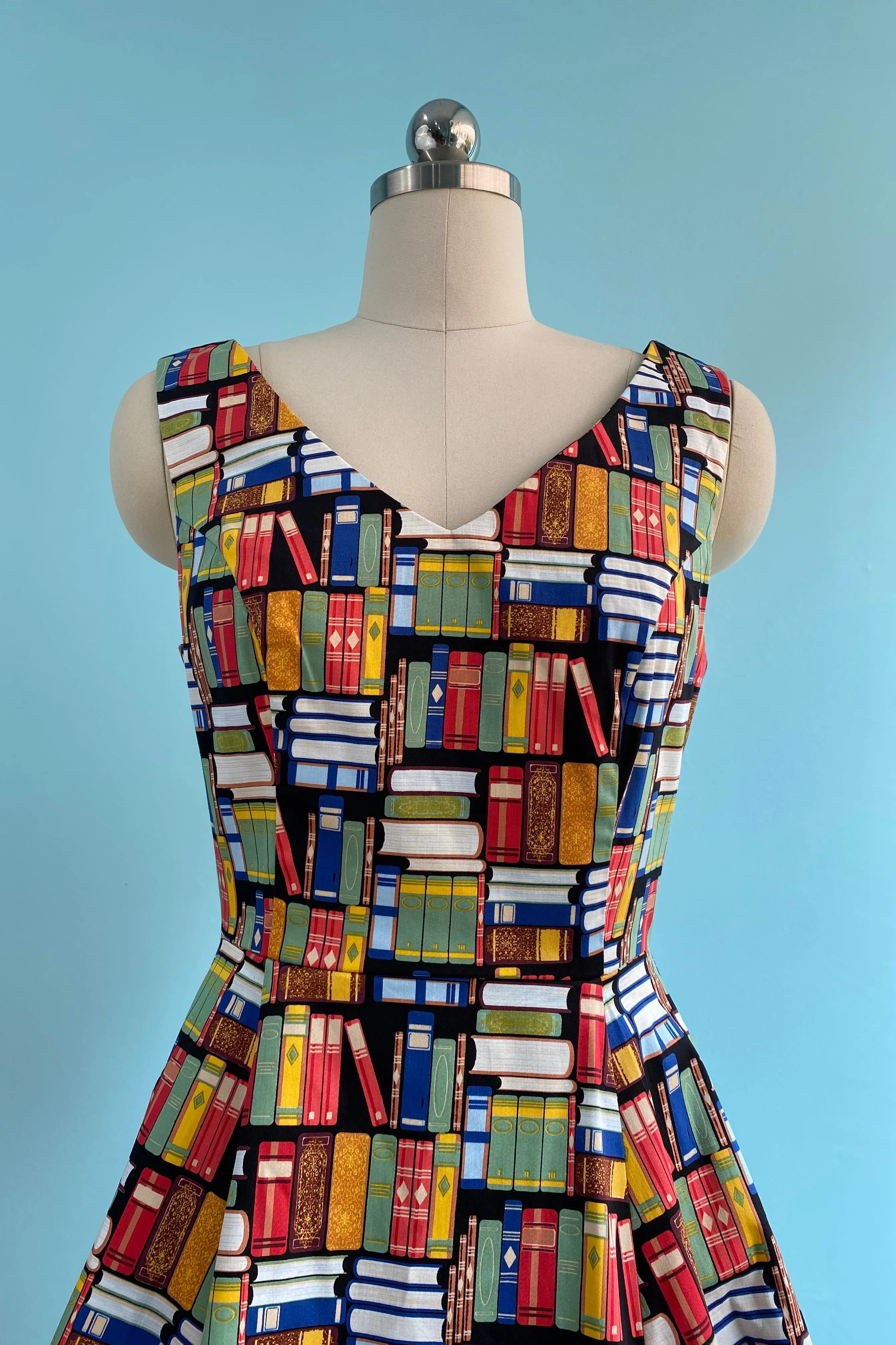 Book Print V-Neck Dress by Eva Rose